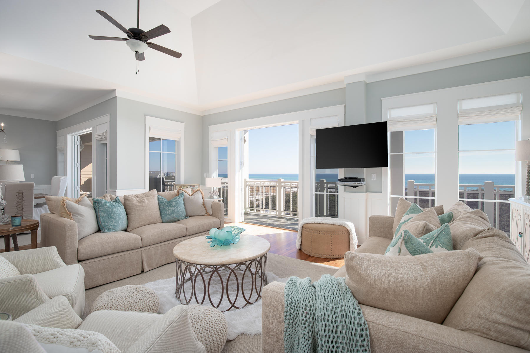 37 Compass Point, Unit 425 Watersound, FL 32461 - Photo 1 of 17 a living room with furniture a flat screen tv and a large window