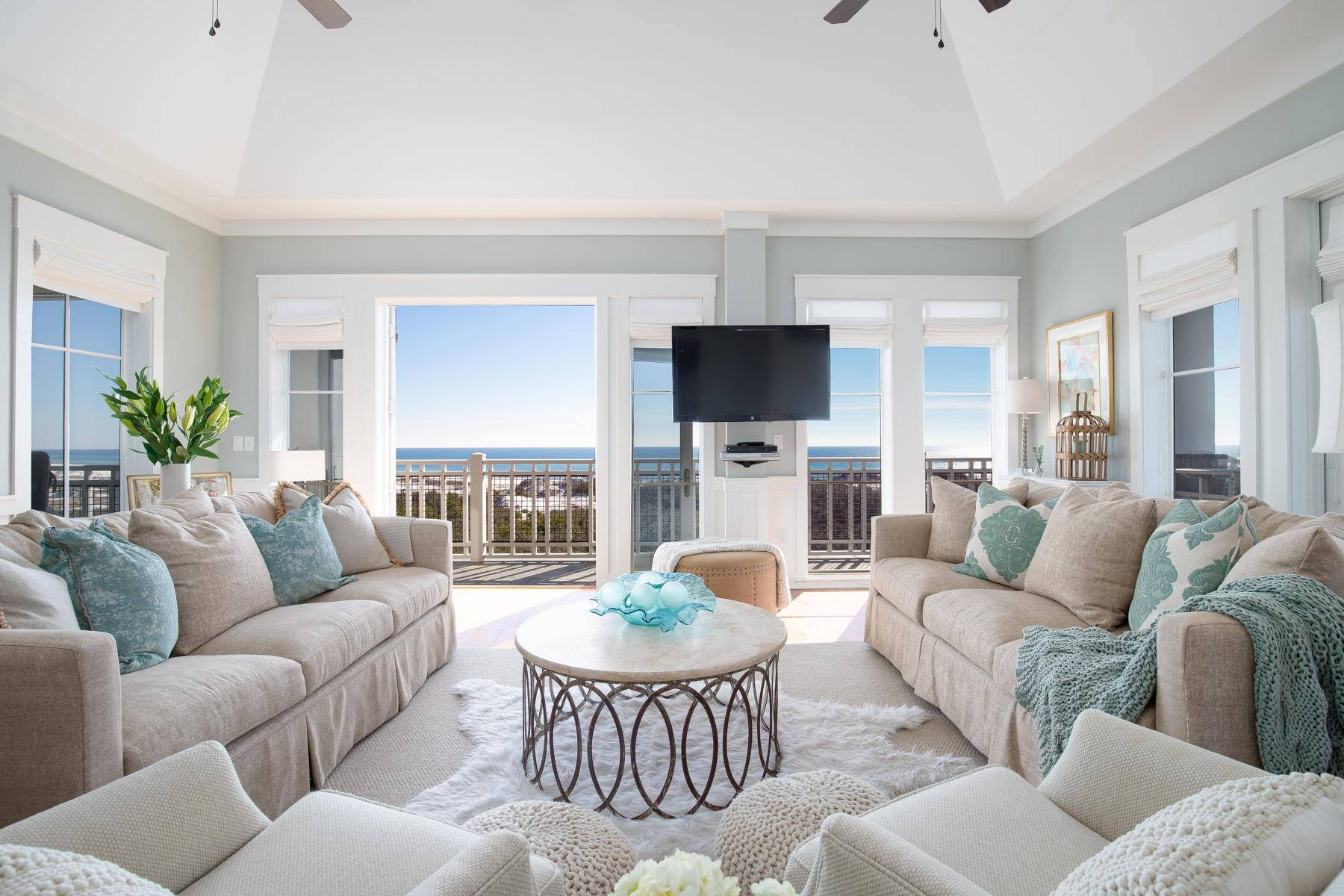 37 Compass Point, Unit 425 Watersound, FL 32461 - Photo 13 of 17 a living room with furniture a fireplace and a flat screen tv
