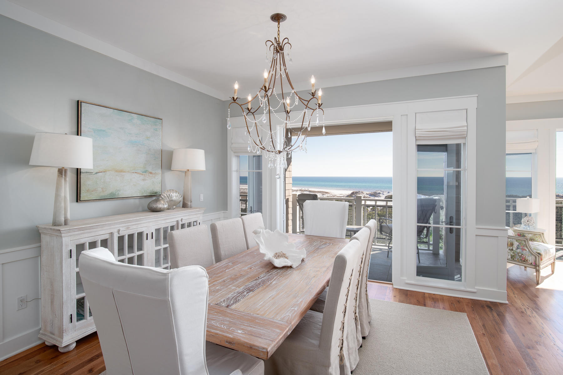 37 Compass Point, Unit 425 Watersound, FL 32461 - Photo 2 of 17 a view of a dining room with furniture window and wooden floor