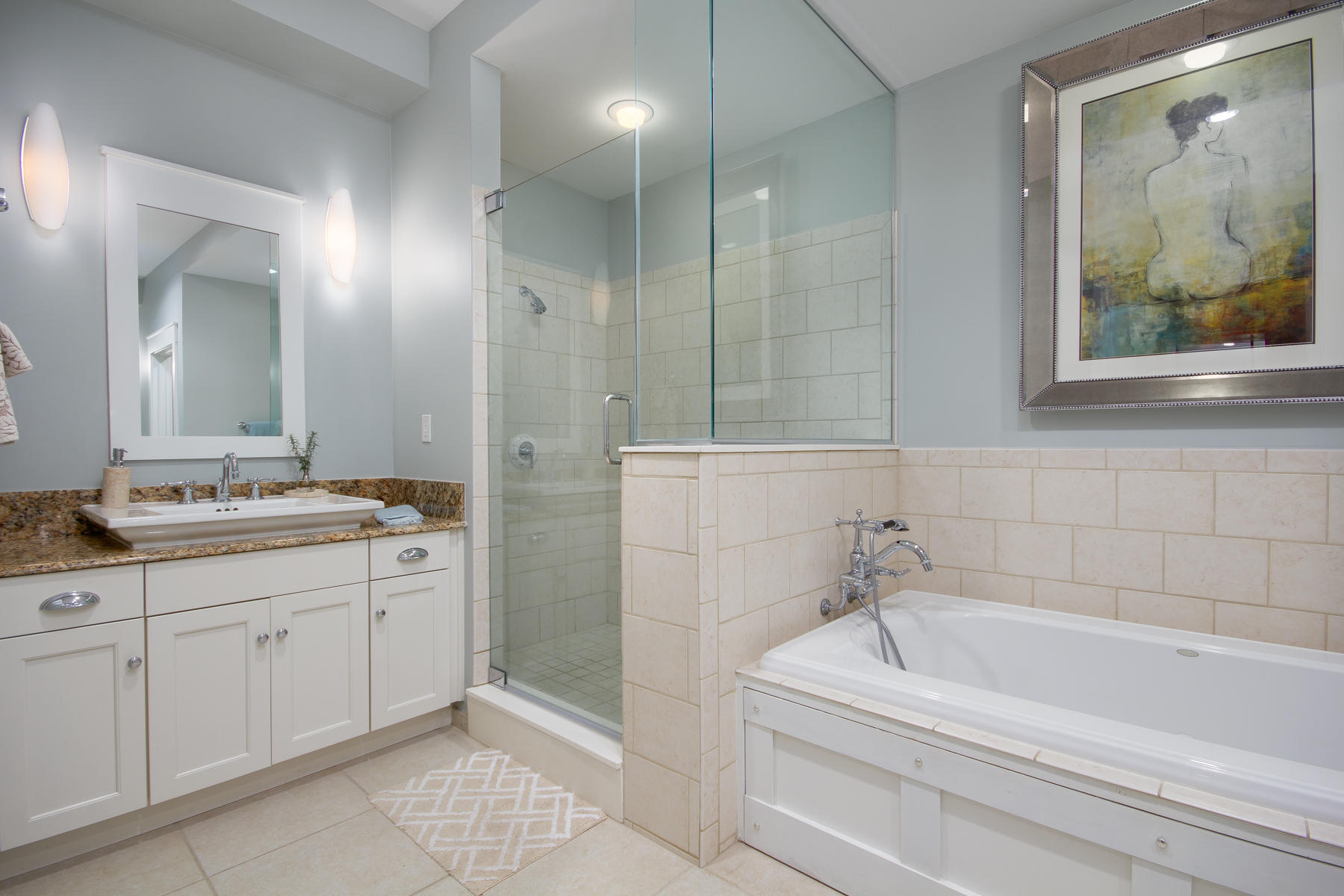 37 Compass Point, Unit 425 Watersound, FL 32461 - Photo 7 of 17 a bathroom with a tub a sink and mirror
