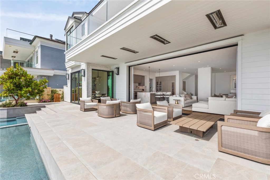 1 Beach View Avenue Dana Point, CA 92629 - Photo 12 of 42 a bedroom with furniture and a large window