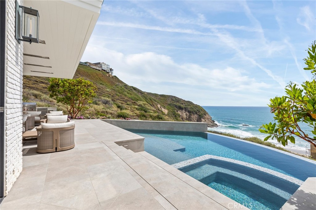 1 Beach View Avenue Dana Point, CA 92629 - Photo 13 of 42 a view of city from terrace with outdoor seating