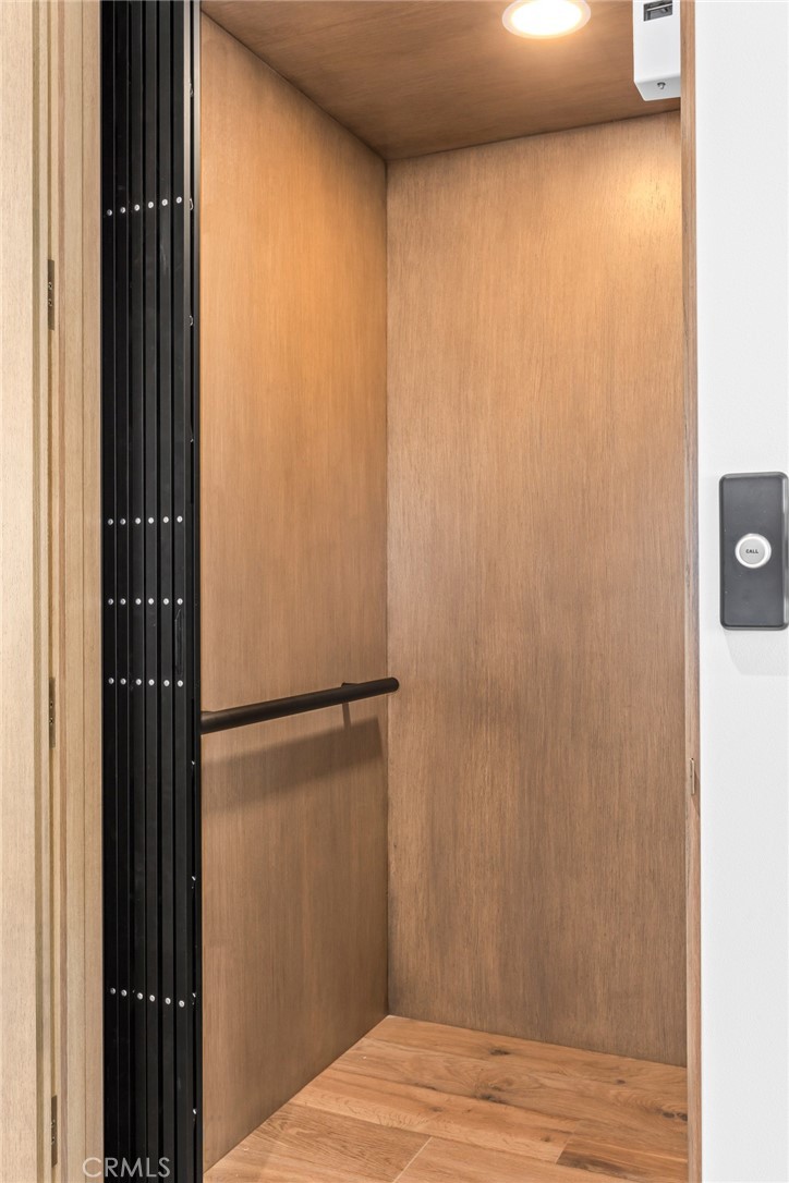 1 Beach View Avenue Dana Point, CA 92629 - Photo 16 of 42 a view of a closet with wooden floor