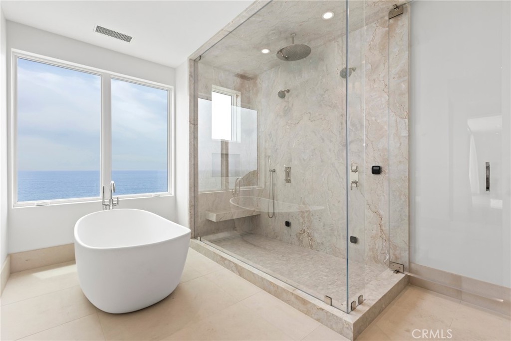 1 Beach View Avenue Dana Point, CA 92629 - Photo 21 of 42 a bathroom with a tub shower and sink