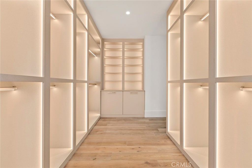 1 Beach View Avenue Dana Point, CA 92629 - Photo 24 of 42 a view of a hallway with wooden floor and staircase