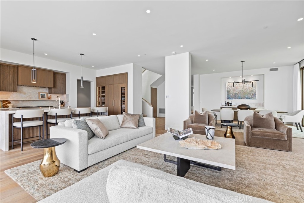1 Beach View Avenue Dana Point, CA 92629 - Photo 4 of 42 a living room with furniture kitchen view and a chandelier