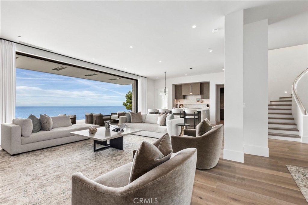 1 Beach View Avenue Dana Point, CA 92629 - Photo 7 of 42 a living room with furniture and a large window