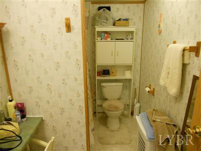 337 Phoebe Pond Road Concord, VA 24538 - Photo 17 of 19 a bathroom with a toilet and shower