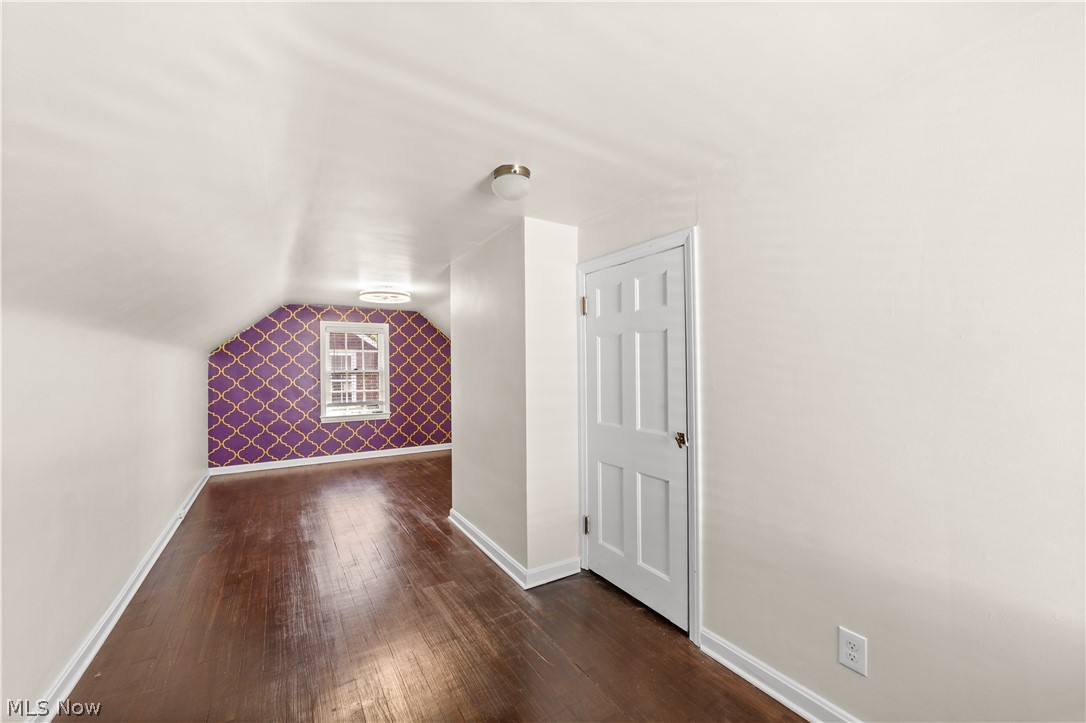 3806 Westwood Road University Heights, OH 44118 - Photo 26 of 41 Attic space featuring wood-finish flooring and sloped ceilings