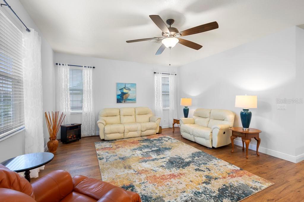 11767 Southeast 176th Place Road Summerfield, FL 34491 - Photo 14 of 37 FAMILY ROOM OFF KITCHEN