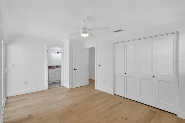 a view of cabinets with granite countertop