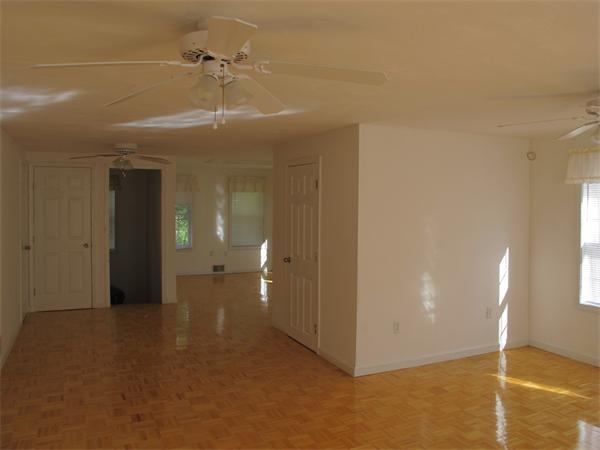 16 Butler Street Wareham, MA 02532 - Photo 3 of 7 a view of a room with an entryway and chandelier fan