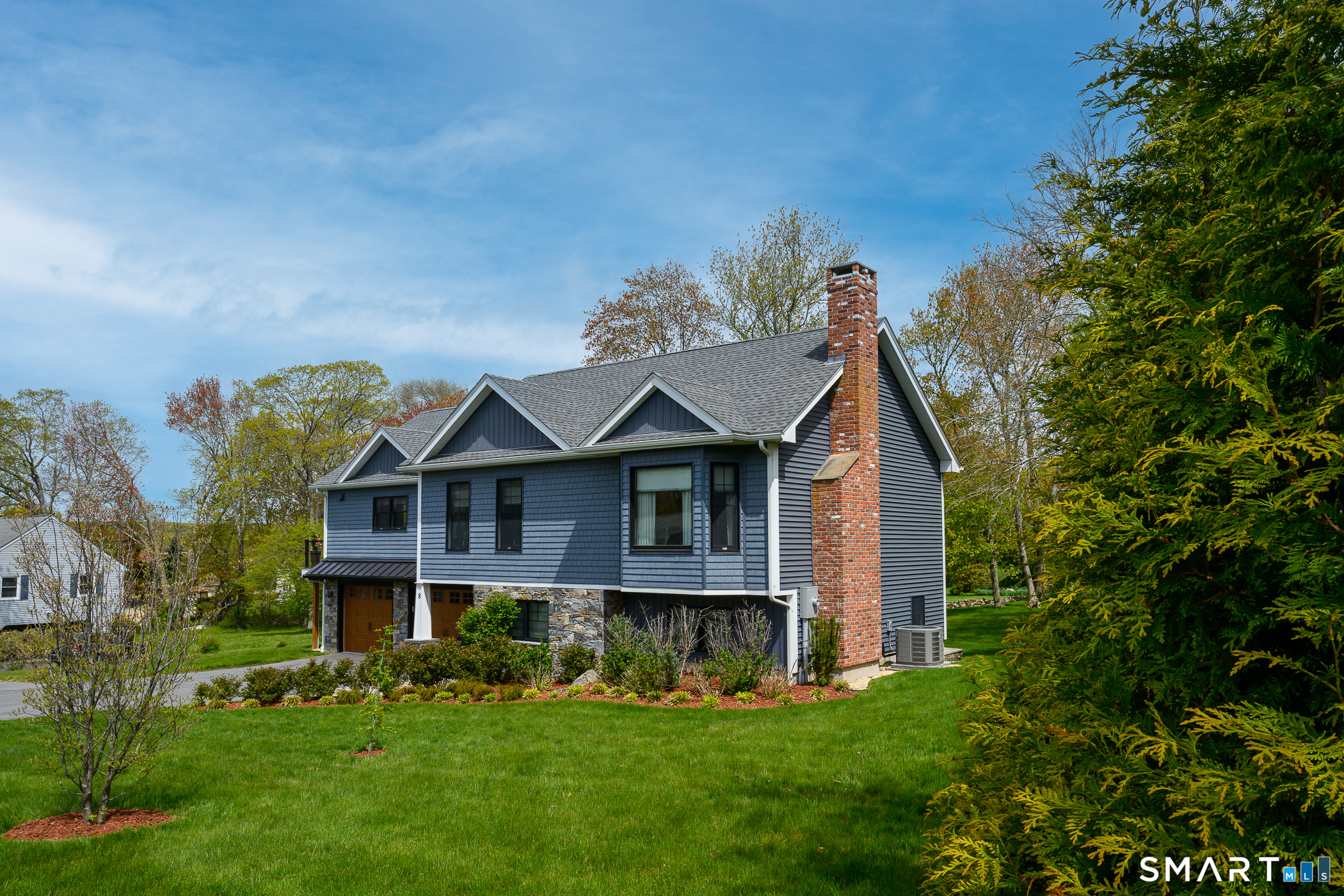 8 East Wharf Road Waterford, CT 06385 - Photo 32 of 40 a view of a big yard with plants and large trees