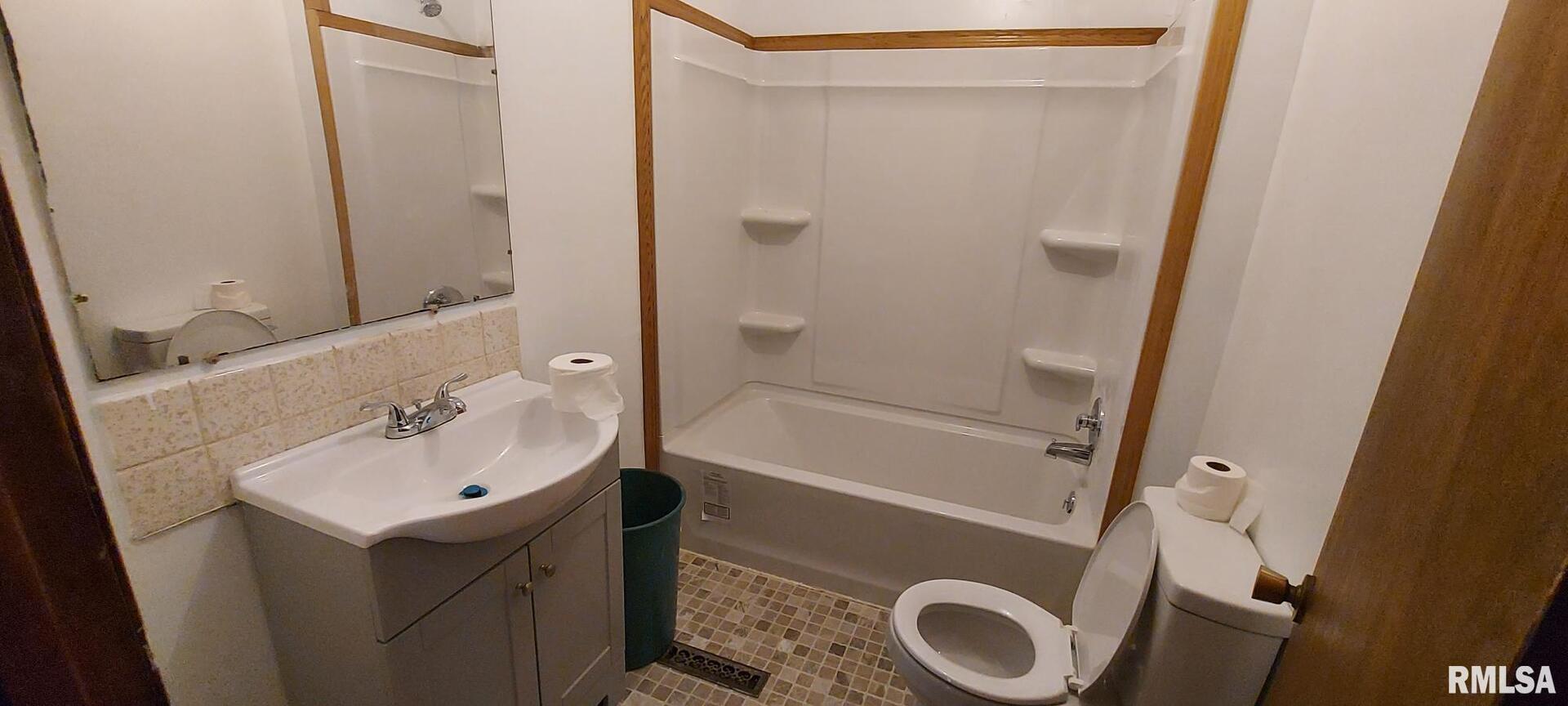 862 270th Street Viola, IL 61486 - Photo 15 of 17 a bathroom with a sink a toilet and shower