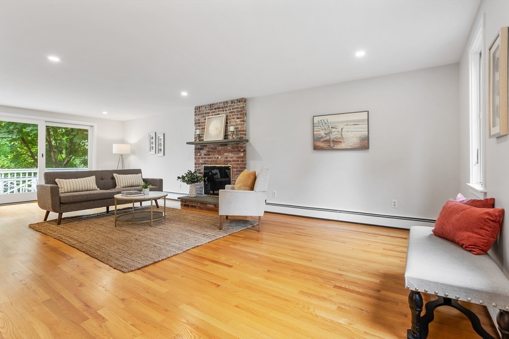444 Middle Road Boxborough, MA 01719 - Photo 19 of 42 a living room with furniture and a fireplace