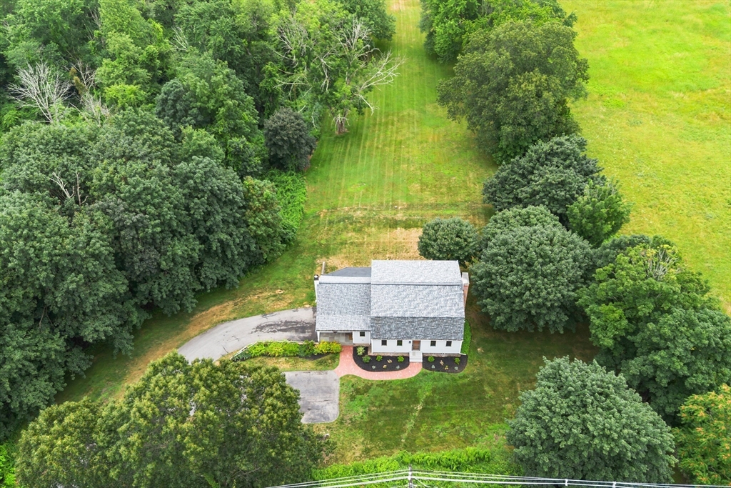 444 Middle Road Boxborough, MA 01719 - Photo 2 of 42 a garden view with a seating space