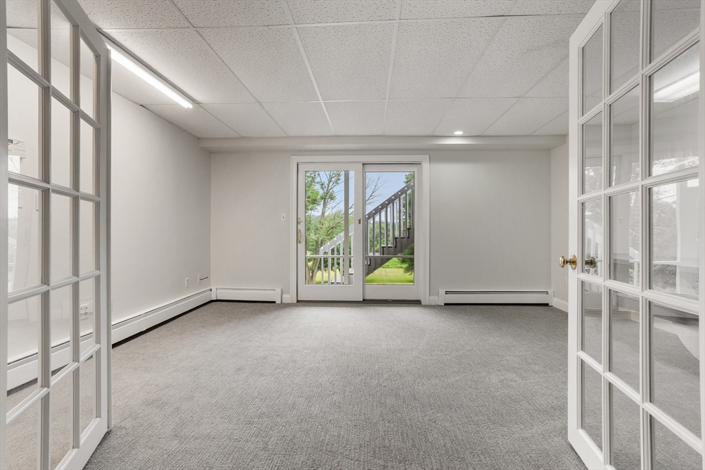 444 Middle Road Boxborough, MA 01719 - Photo 26 of 42 an empty room with windows
