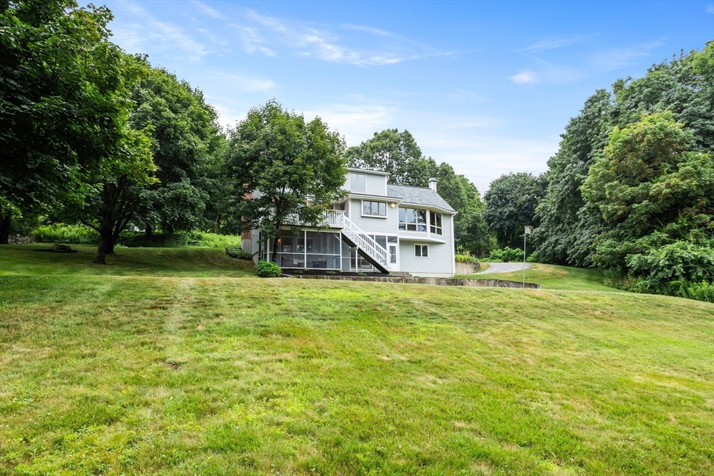 444 Middle Road Boxborough, MA 01719 - Photo 3 of 42 a house view with a outdoor space