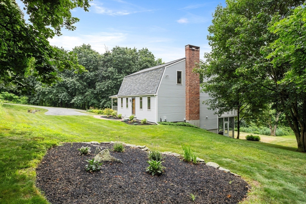 444 Middle Road Boxborough, MA 01719 - Photo 32 of 42 a view of a house with a yard