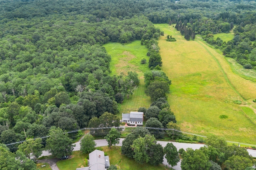444 Middle Road Boxborough, MA 01719 - Photo 35 of 42 a aerial view of a residential houses with yard and swimming pool
