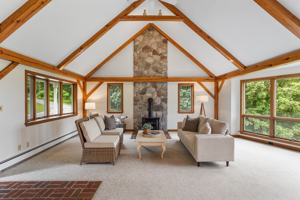 444 Middle Road Boxborough, MA 01719 - Photo 4 of 42 a living room with furniture and a large window