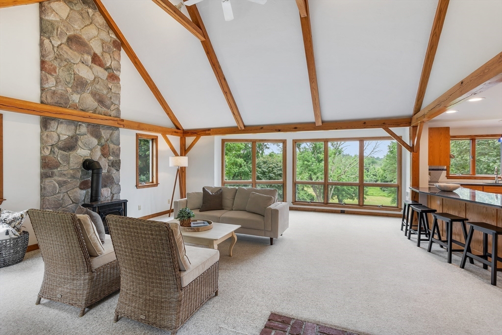 444 Middle Road Boxborough, MA 01719 - Photo 5 of 42 a living room with furniture and a large window