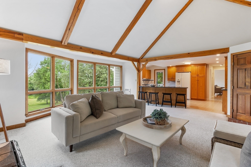 444 Middle Road Boxborough, MA 01719 - Photo 6 of 42 a living room with furniture and a large window