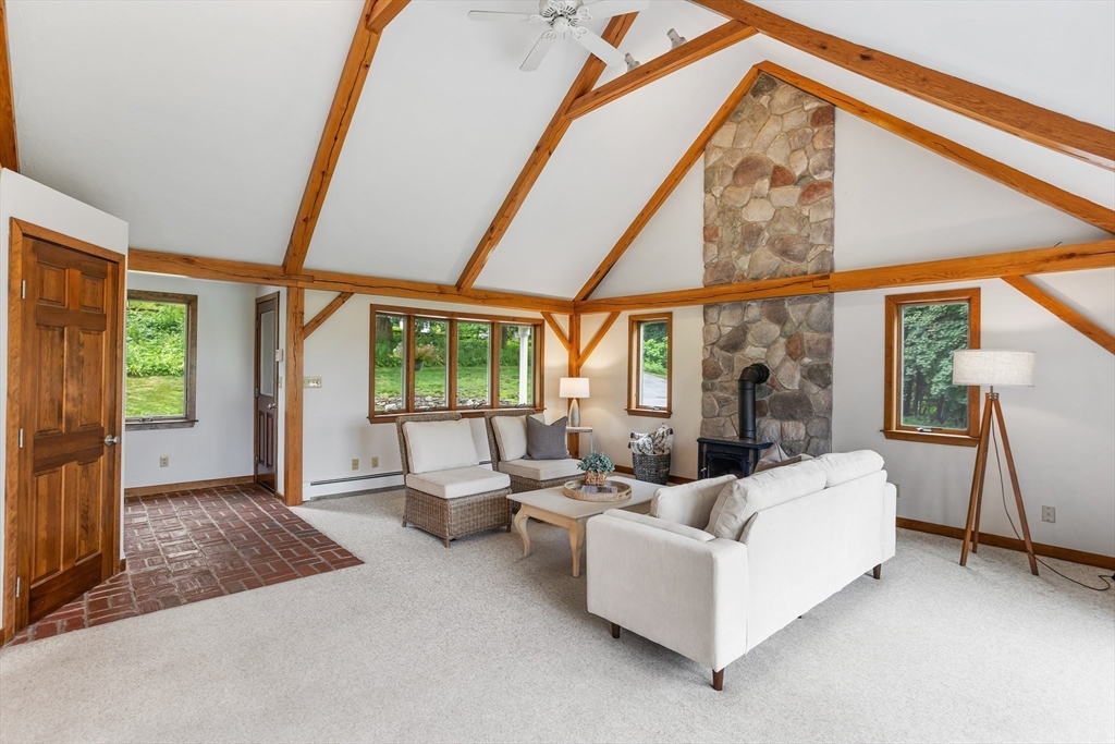 444 Middle Road Boxborough, MA 01719 - Photo 7 of 42 a living room with furniture and a window