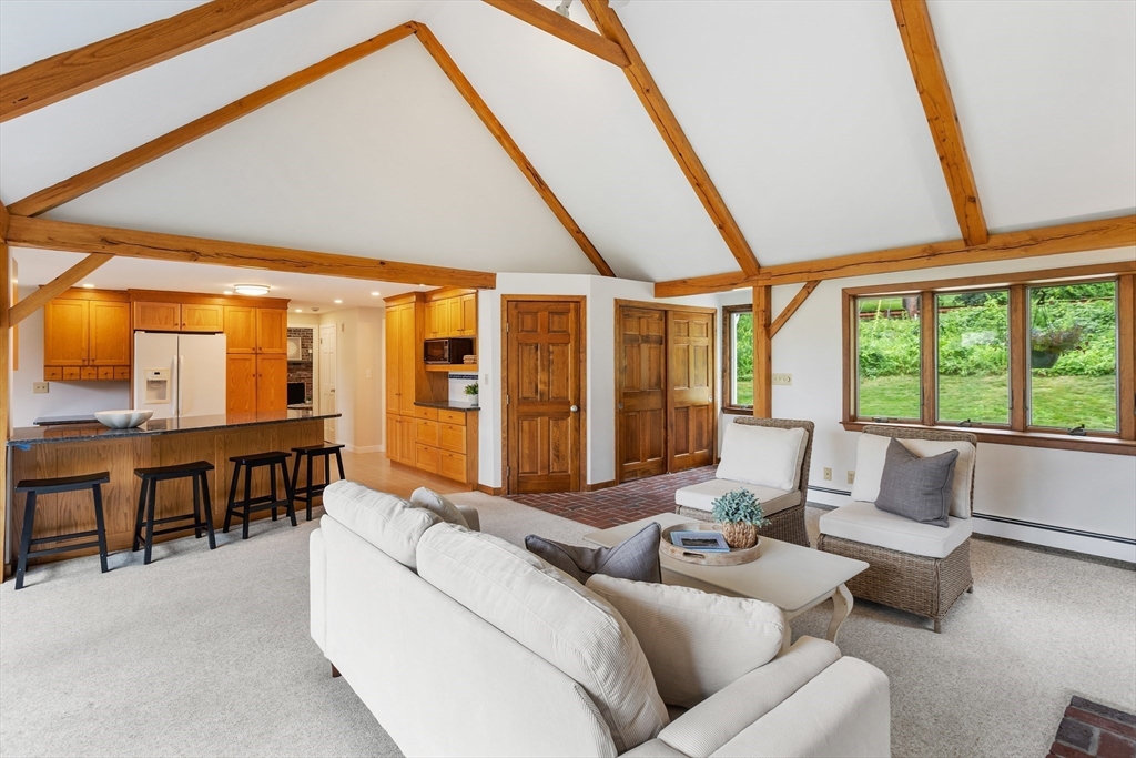 444 Middle Road Boxborough, MA 01719 - Photo 9 of 42 a living room with furniture and large windows