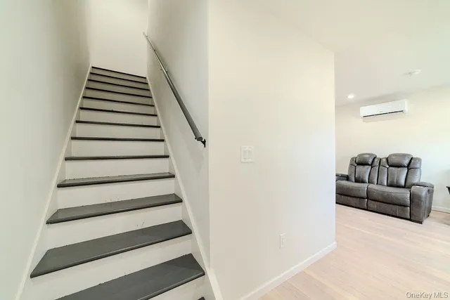 a living room with furniture and window