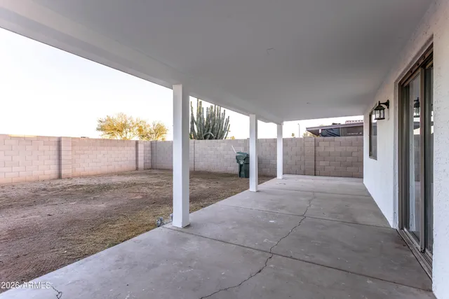 a bathroom with a shower and a glass door