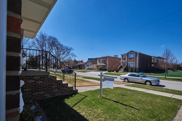 a house view with a garden space