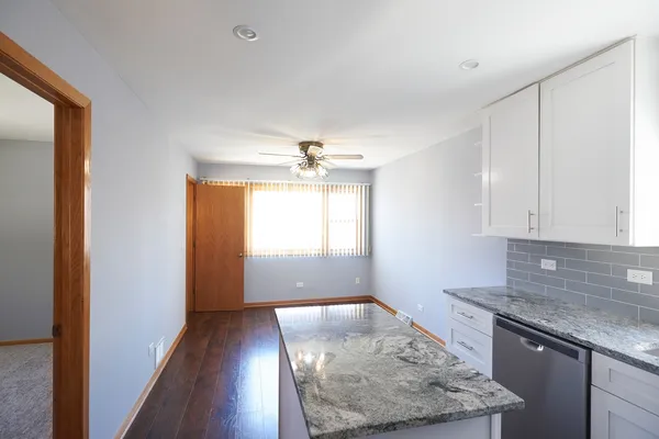 a view of a kitchen cabinets a sink and dishwasher