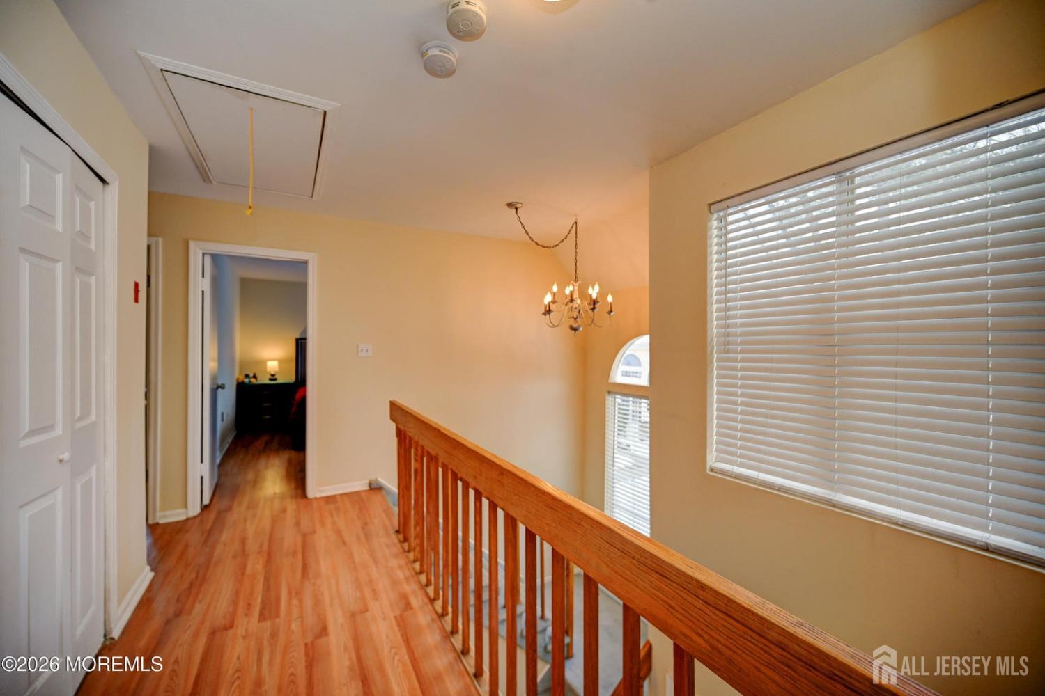 22 Borell Square Parlin, NJ 08859 - Photo 23 of 32 a view of a hallway with wooden floor and staircase