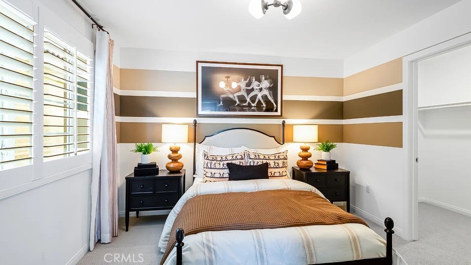 1676 Phantom Lane Rialto, CA 92376 - Photo 6 of 22 a bedroom with a bed and a window