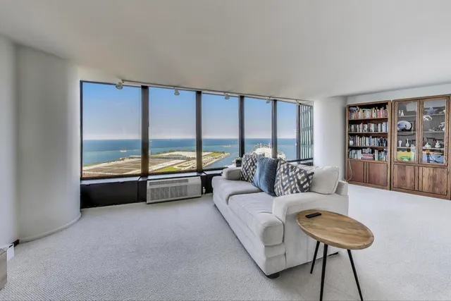 a kitchen with stainless steel appliances granite countertop a sink stove microwave and cabinets