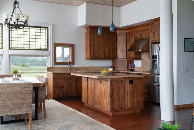 a front view of a house with entryway and wooden floor
