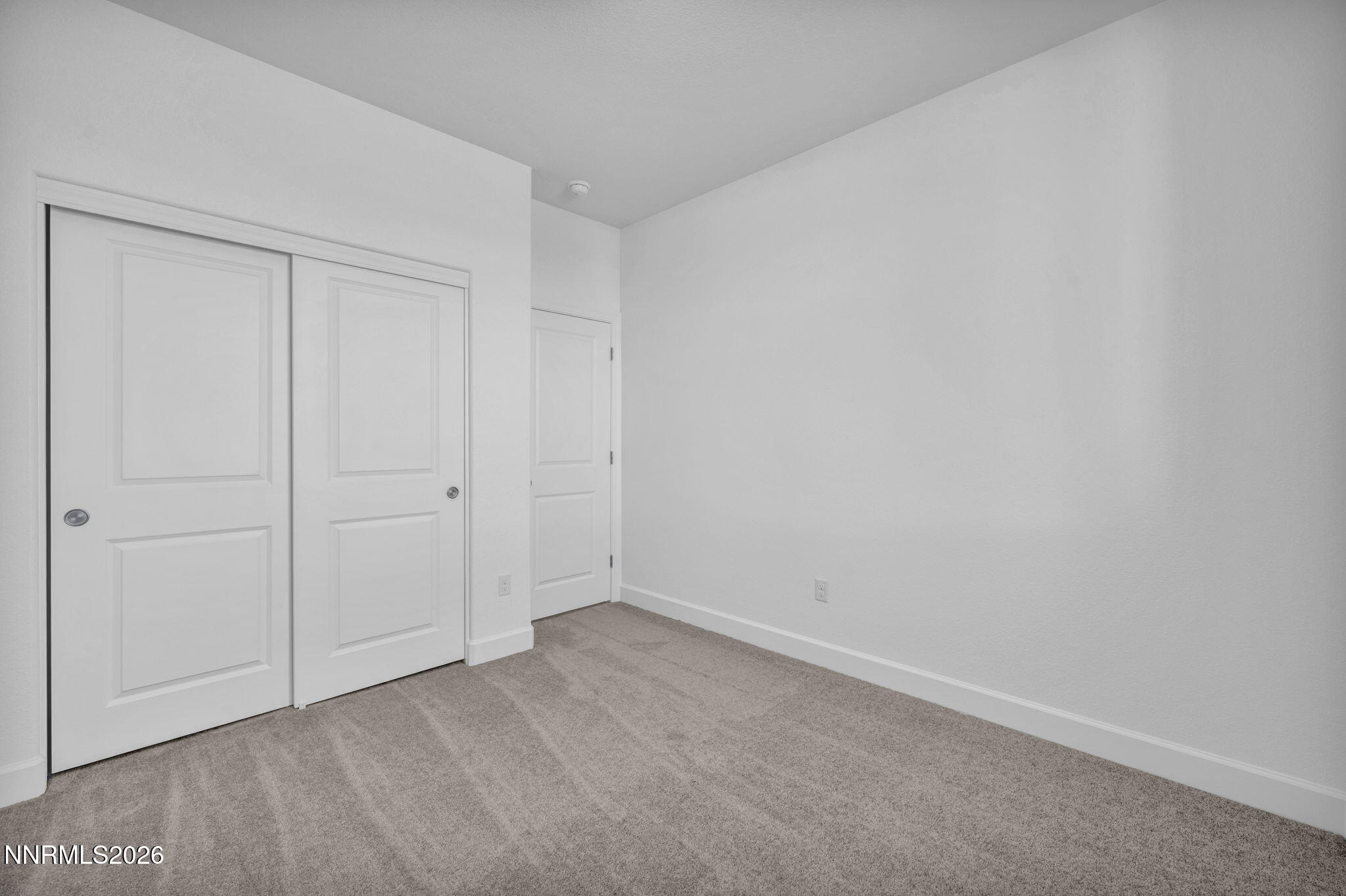 3659 Carson Way, Unit LOT 117 Fernley, NV 89408 - Photo 11 of 24 a view of an empty room