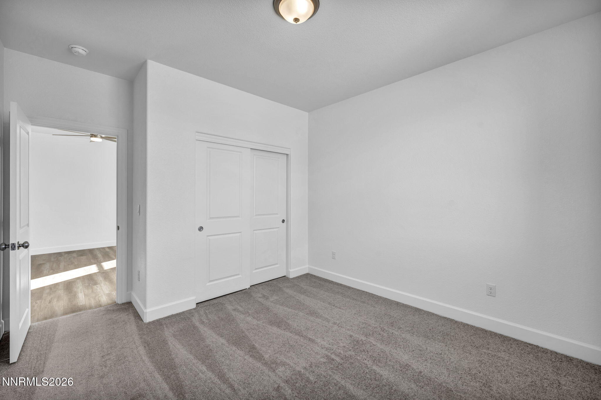 3659 Carson Way, Unit LOT 117 Fernley, NV 89408 - Photo 15 of 24 wooden floor in an empty room