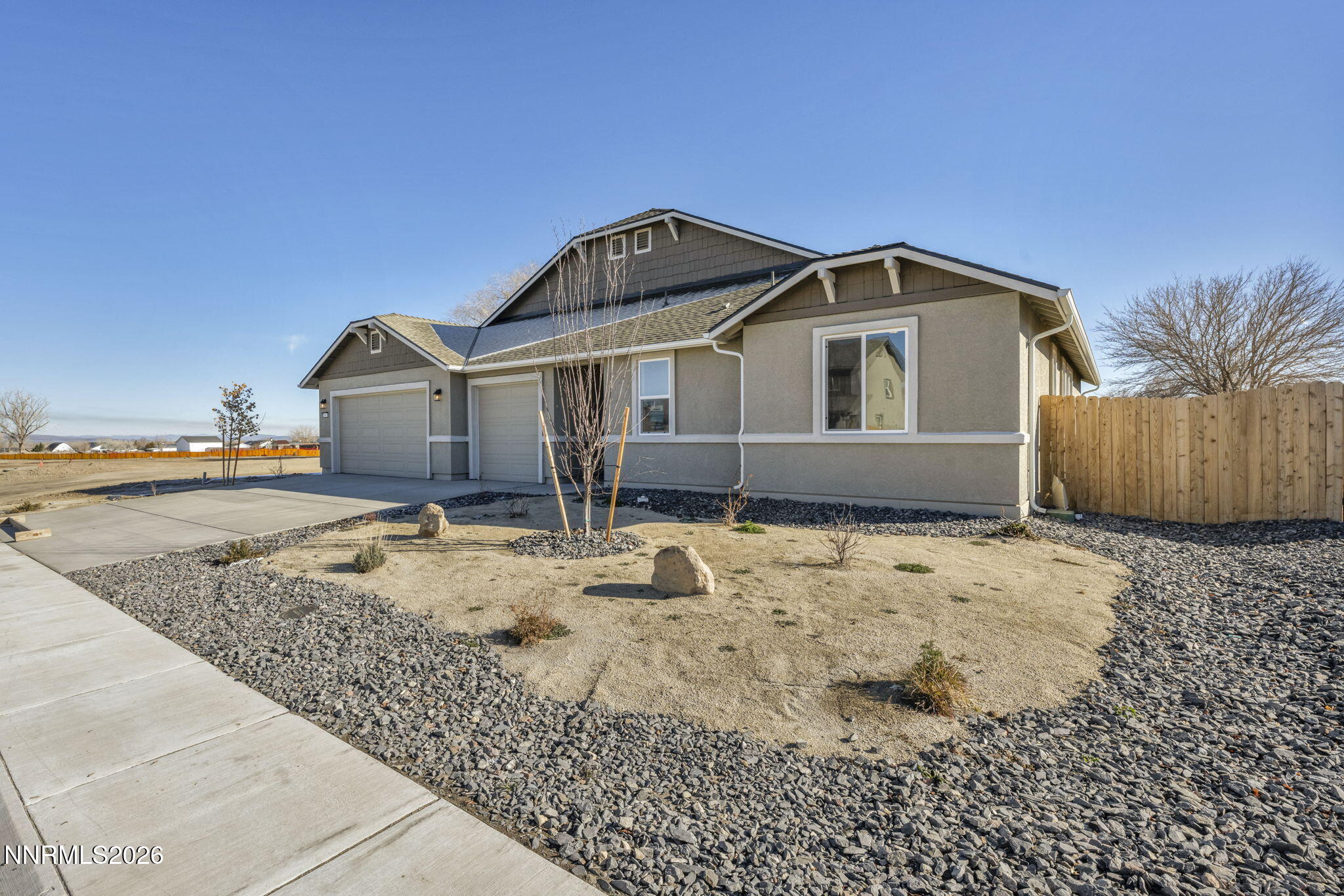 3659 Carson Way, Unit LOT 117 Fernley, NV 89408 - Photo 3 of 24 a front view of a house with a yard
