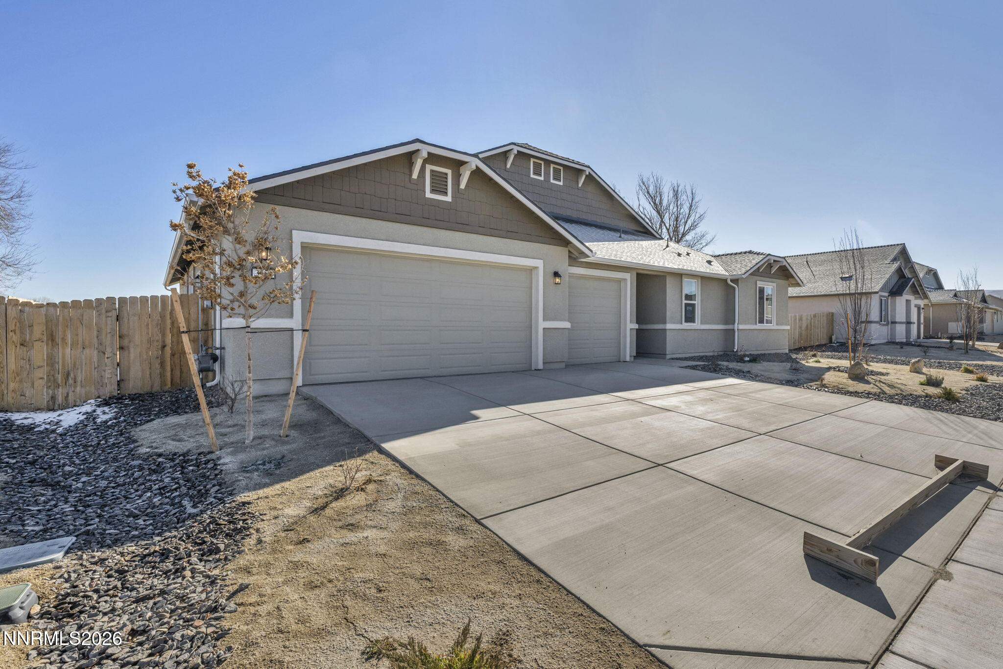 3659 Carson Way, Unit LOT 117 Fernley, NV 89408 - Photo 4 of 24 a front view of a house with a yard