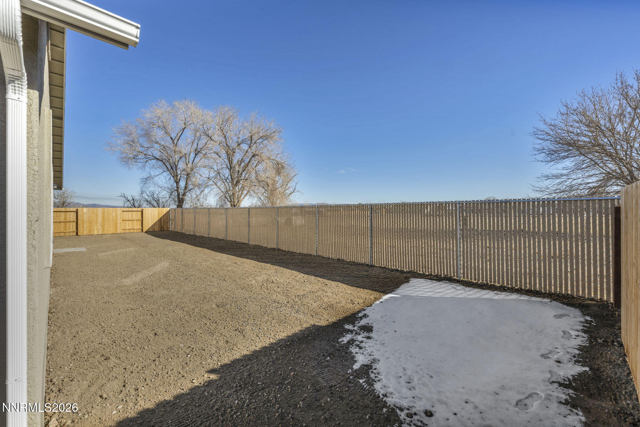 3659 Carson Way, Unit LOT 117 Fernley, NV 89408 - Photo 5 of 24 a view of a backyard