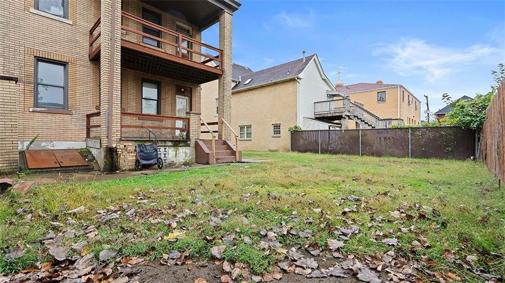 315 Catherine Street McKees Rocks, PA 15136 - Photo 28 of 38 a view of a house with backyard and a tree