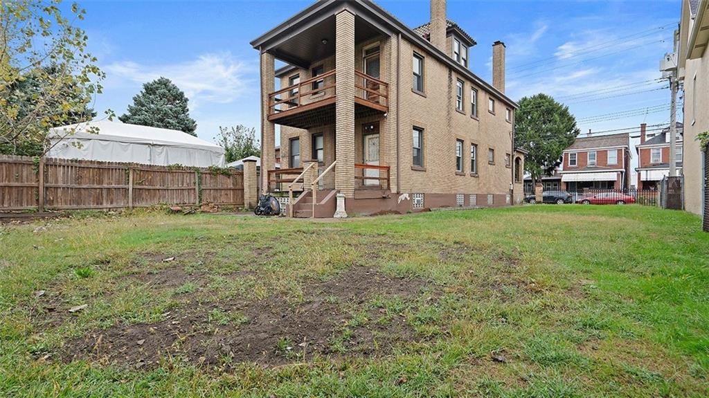315 Catherine Street McKees Rocks, PA 15136 - Photo 29 of 38 a view of a house with a yard and sitting area