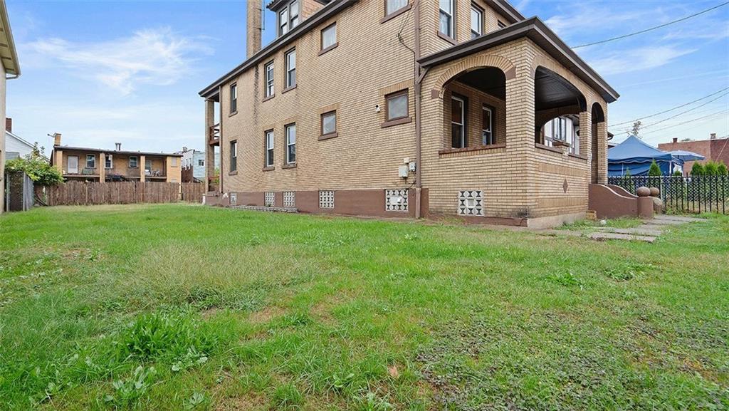315 Catherine Street McKees Rocks, PA 15136 - Photo 31 of 38 a view of a house with a yard