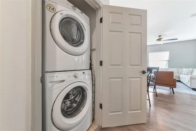 a bedroom with a bed and a chair