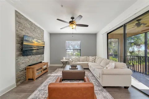 a kitchen with a refrigerator and a sink