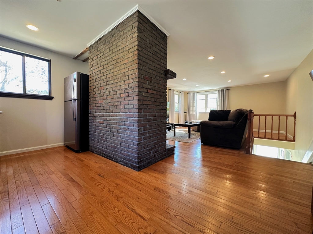 8 Jacques Lane Gloucester, MA 01930 - Photo 11 of 36 a view of a livingroom with furniture and wooden floor