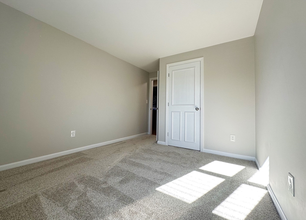 8 Jacques Lane Gloucester, MA 01930 - Photo 19 of 36 an empty room with windows