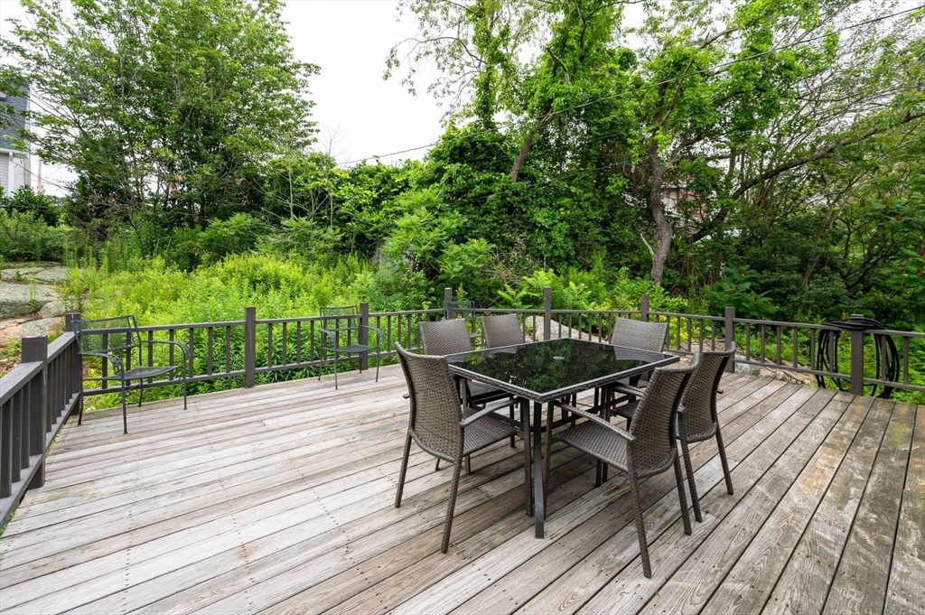 8 Jacques Lane Gloucester, MA 01930 - Photo 28 of 36 a view of a deck with wooden floor and outdoor seating